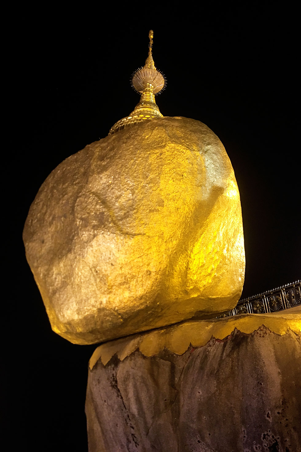 The golden rock of Mount Kyaiktiyo by night